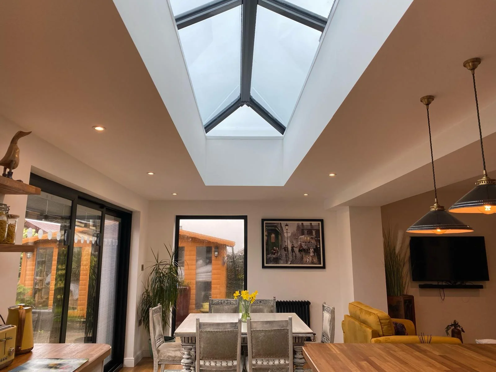 White wood table in modern living room extension