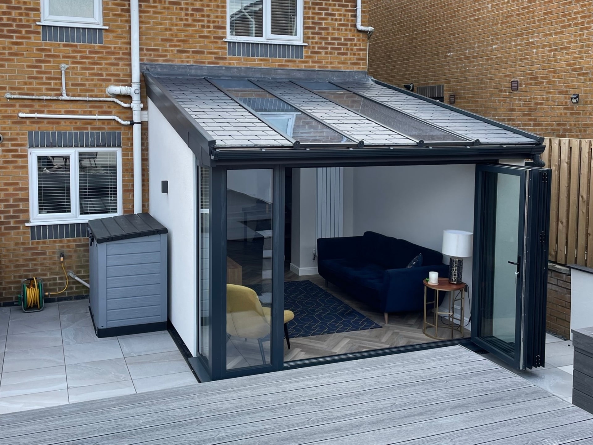 Outdoor shot of flat angled roof in black with white rendering