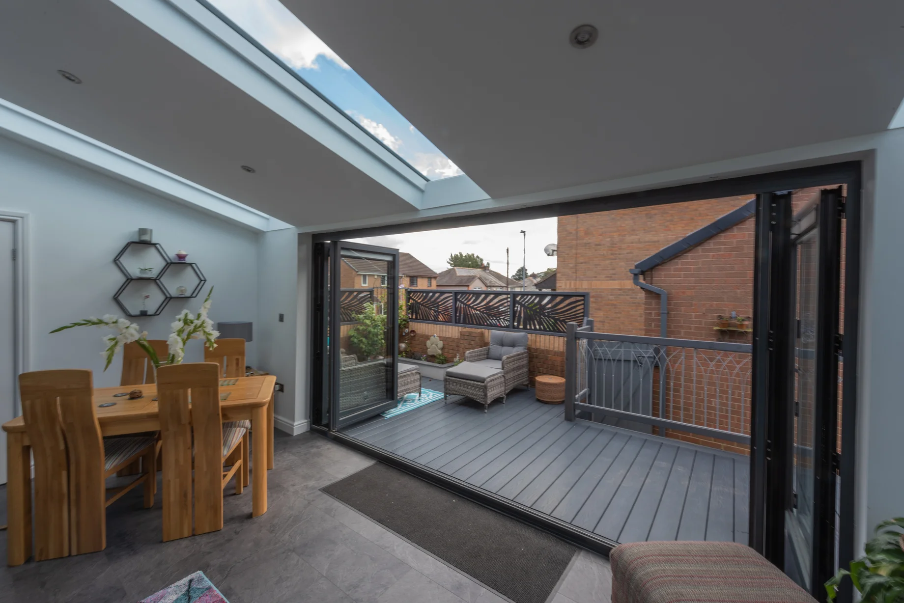 Wide angle view of hup! extension with bi-folding doors