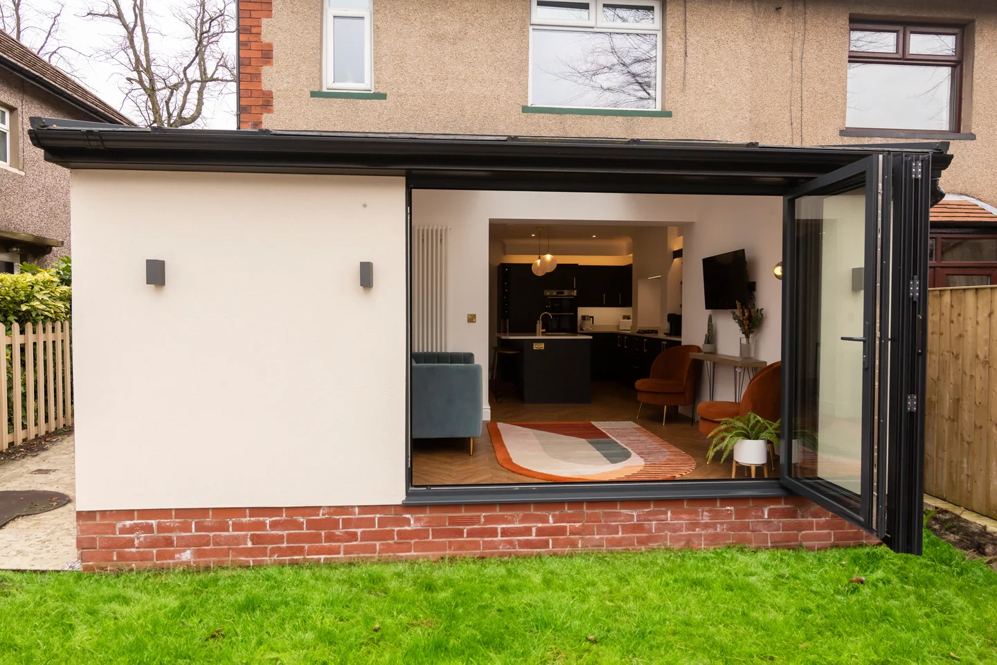UK semi-detached conservatory conversion with bi-fold doors