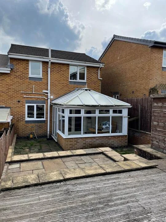 Outdated UK conservatory with glass roof