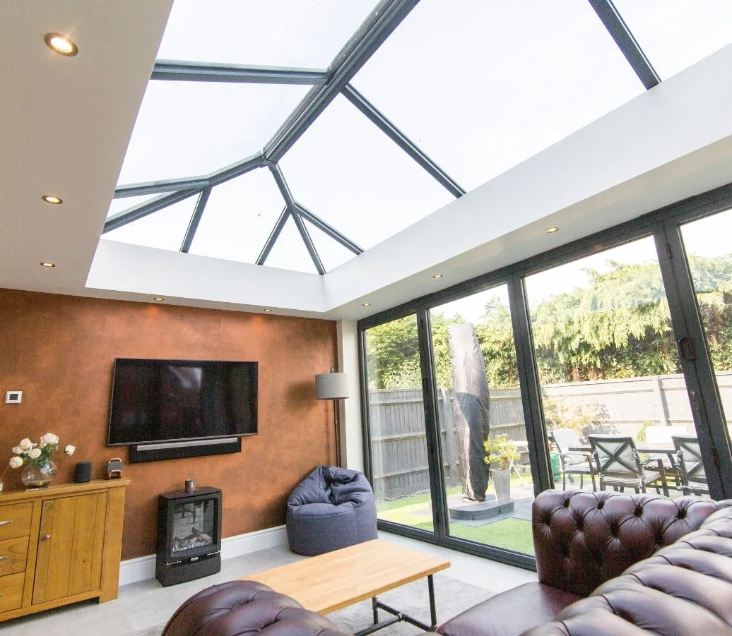 UK home with orangery conversion, overlooking back garden