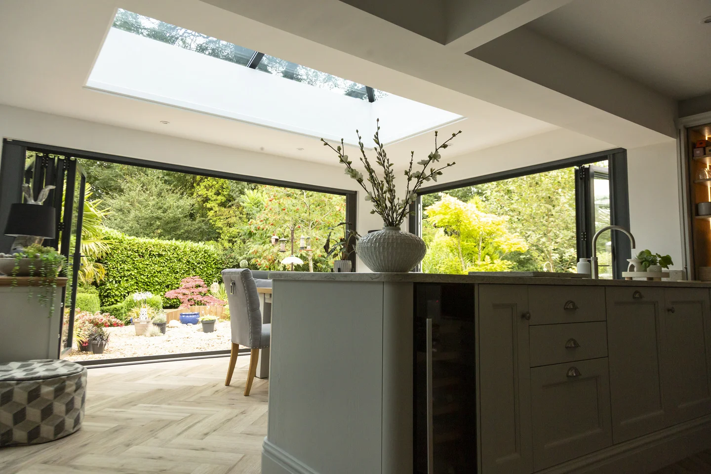 Low down view in family home kitchen with open plan living